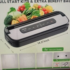 Brand new Vacuum Machine With Bags (Was Duplicate Gift)